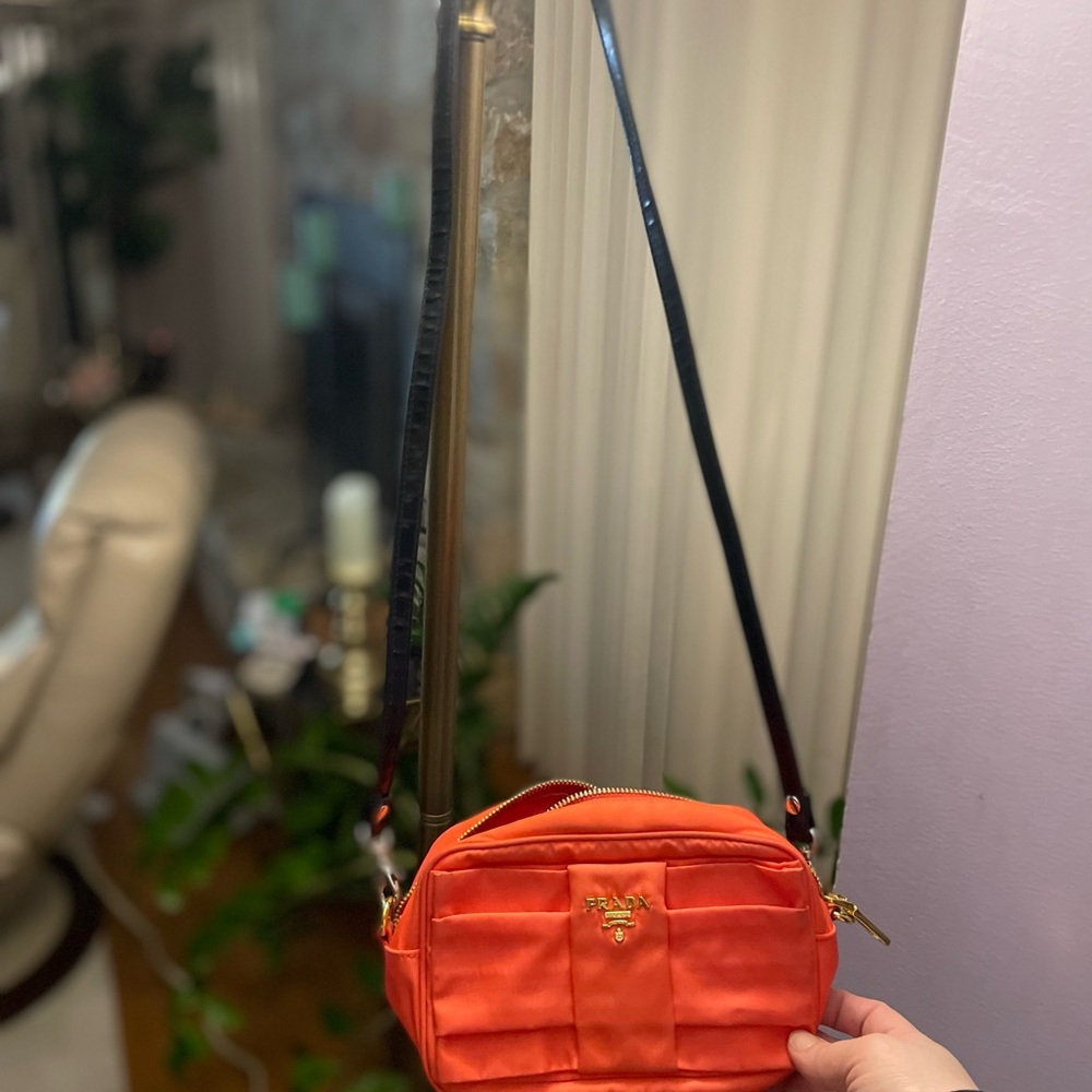 Prada small bag in orange - like new condition